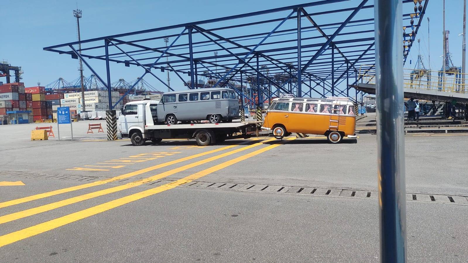 Two Volkswagen Buses on the dock in Brazil, prepared for Roll-on/Roll-off (RoRo) international shipping.